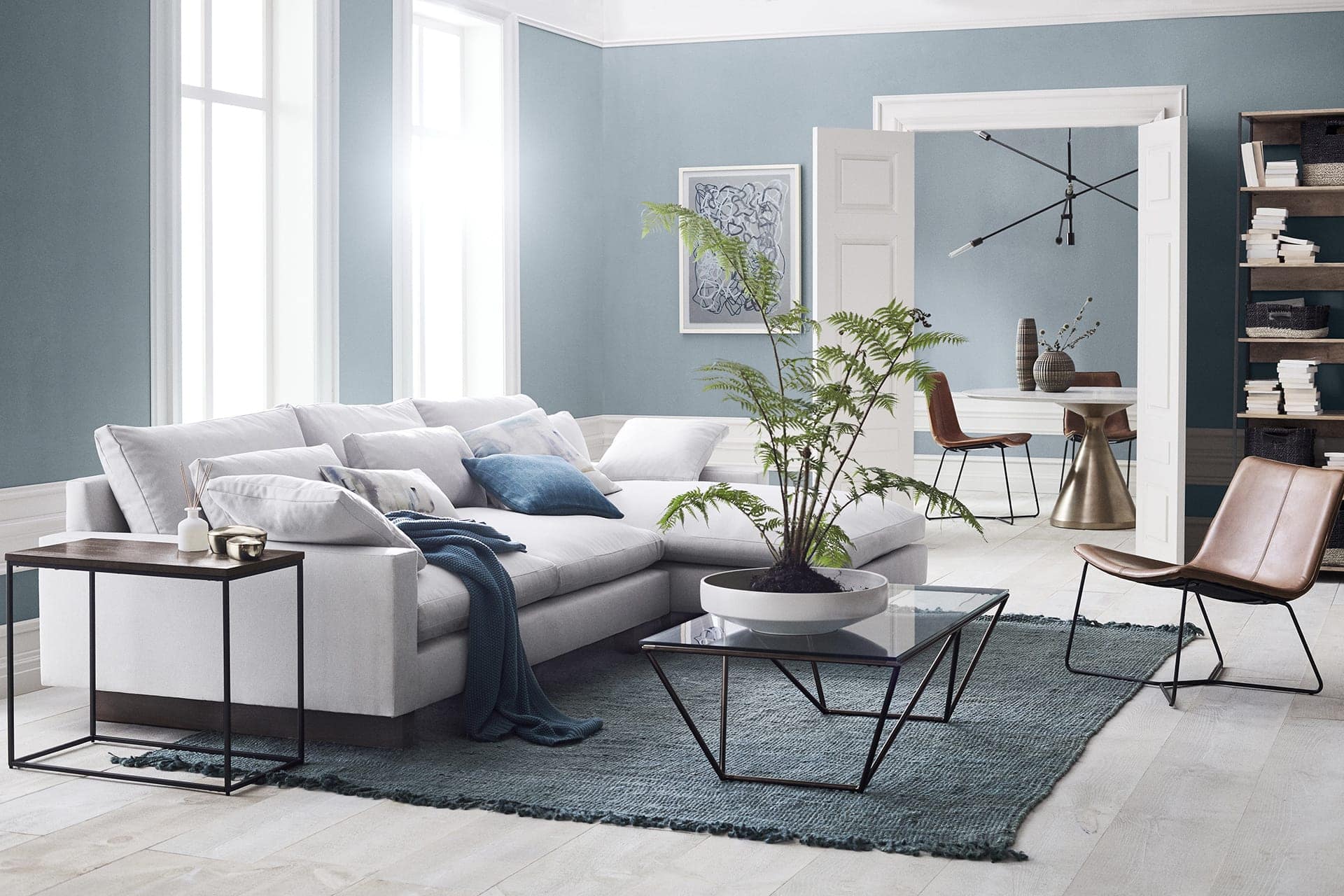 Furniture Elegant shop -Furniture Elegant shop West Elm Living room with light blue walls and white trims